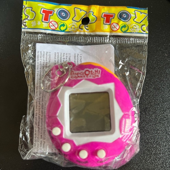 Tamagotchi Keychain Pink Unopened - Picture 1 of 5